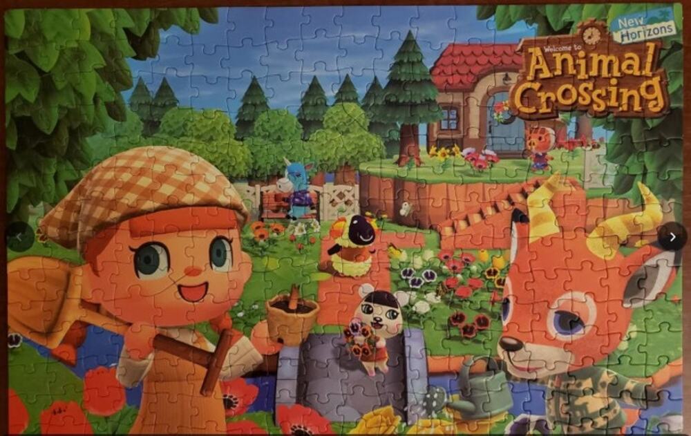 Animal Crossing: "Spring" Themed 250 Pc Puzzle in a Yellow Collector Tin